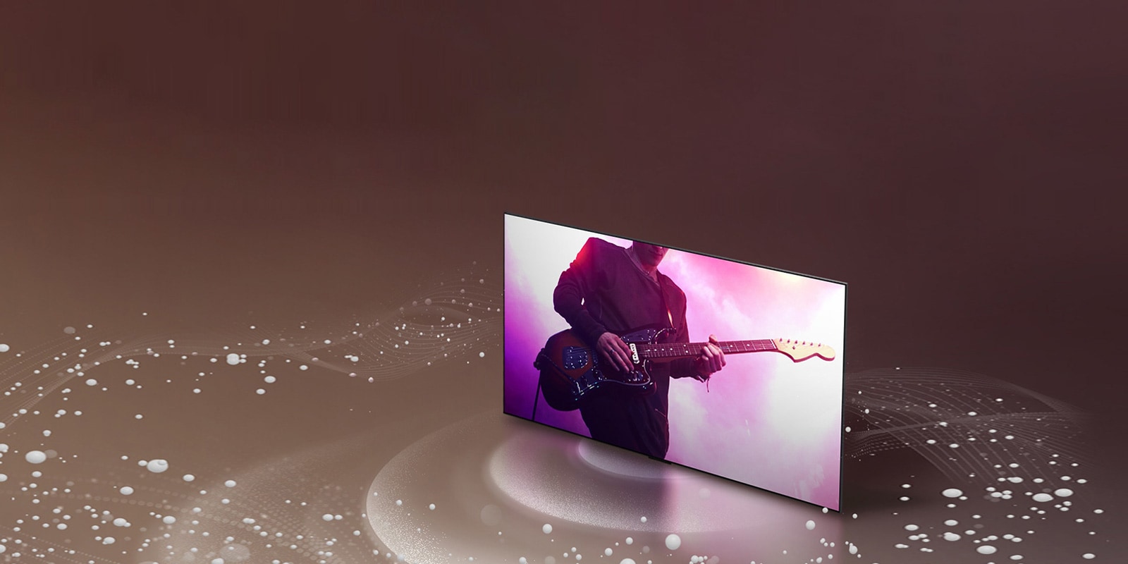 Ein LG OLED TV, mit Klangblasen und Wellen, die vom Bildschirm ausgehen und den Raum füllen.