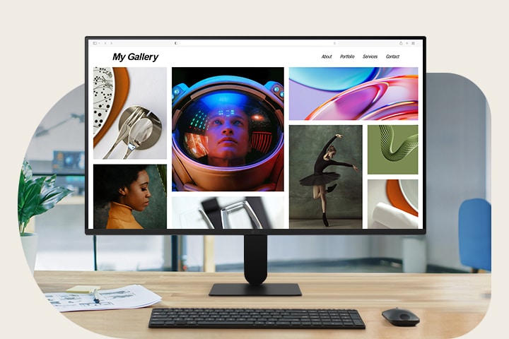 A 27-inch Full HD IPS monitor is displayed on a modern desk setup, showing a colourful photo gallery. The scene highlights the monitor's slim design, vivid colour accuracy with sRGB 99% (Typ.), and sharp Full HD resolution. A keyboard, mouse, coffee cup, and headphones complete the clean workspace.