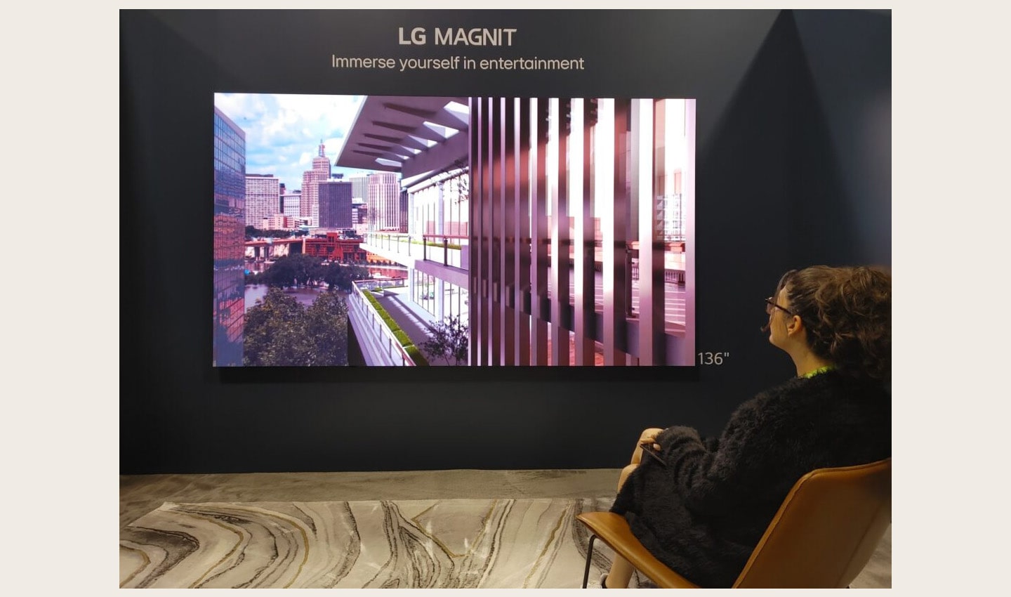 A visitor taking a look at LG MAGNIT installed at HITEC 2023