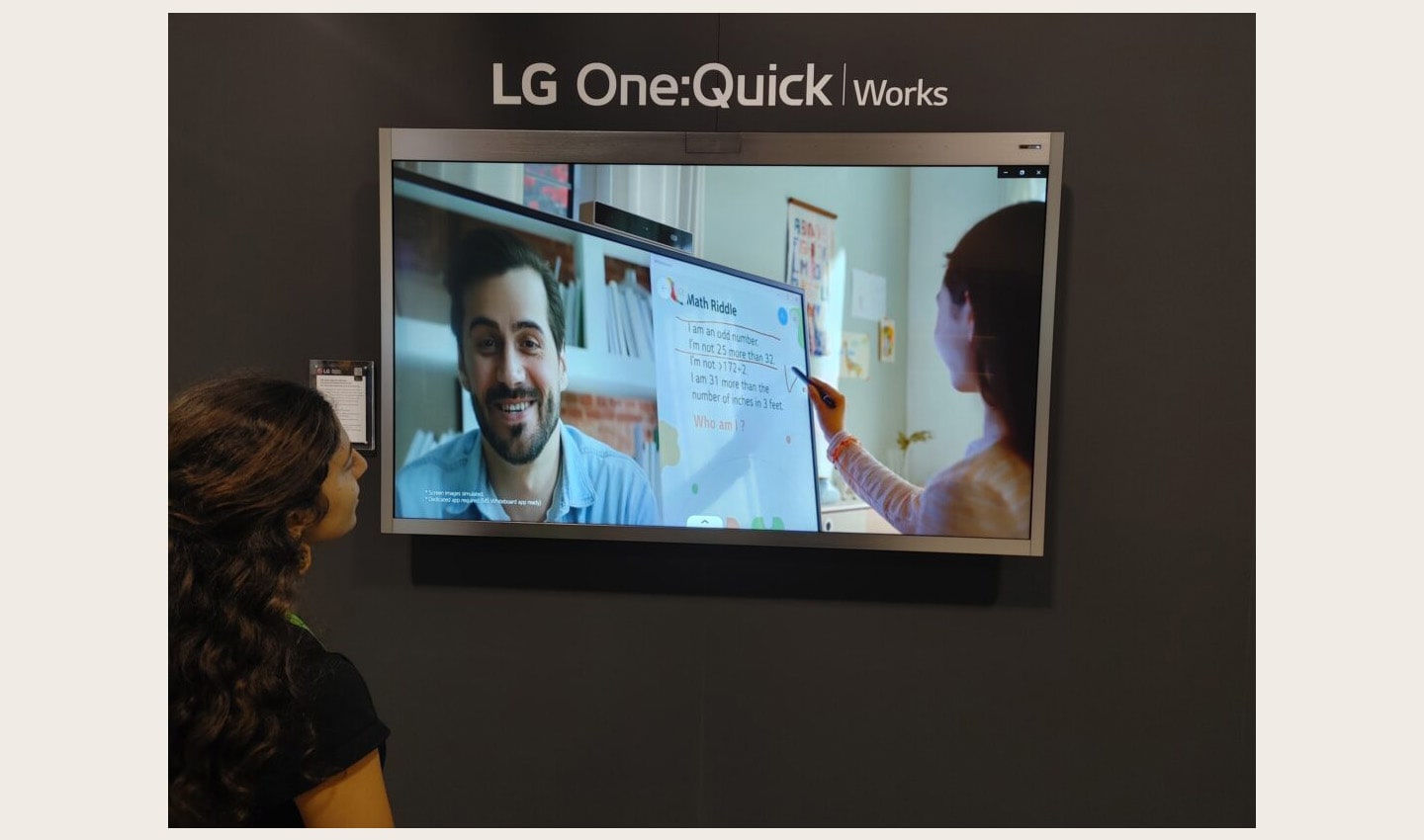 A visitor enjoying a first-hand experience of LG One:Quick Works