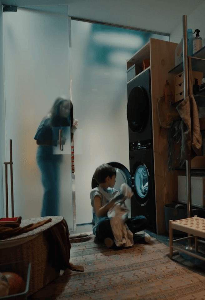 A mother and son use an LG AI washing machine together, turning the dial to activate AI Wash. A man using the LG gram laptop appears in the same sequence.
