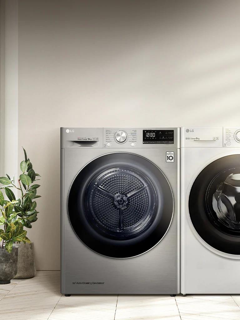 Imagem de uma máquina de lavar e secar colocada lado a lado.
