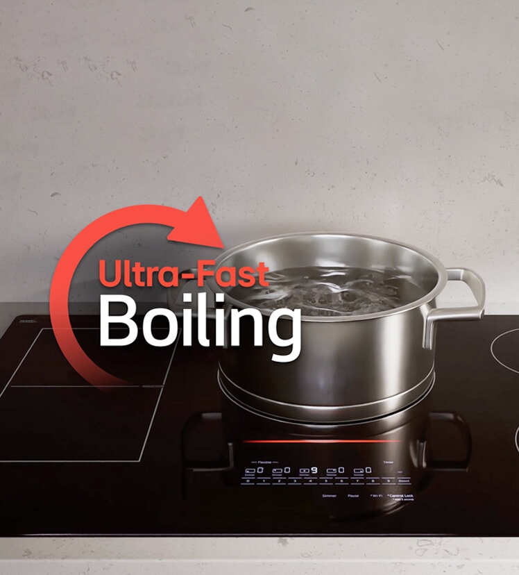 A pot of water boiling rapidly on an LG Induction Cooktop.