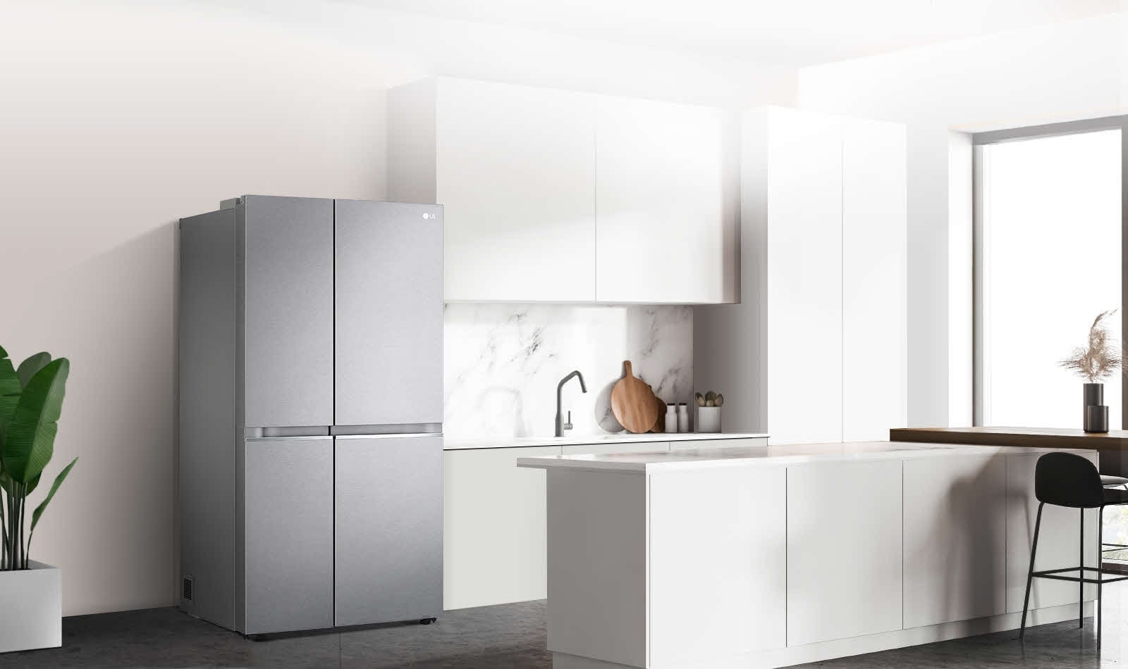 A side view of a kitchen with a black InstaView refrigerator installed.