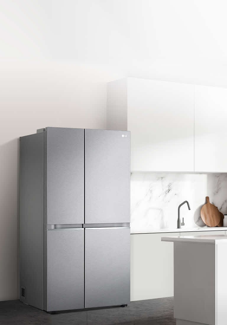 A side view of a kitchen with a black InstaView refrigerator installed.