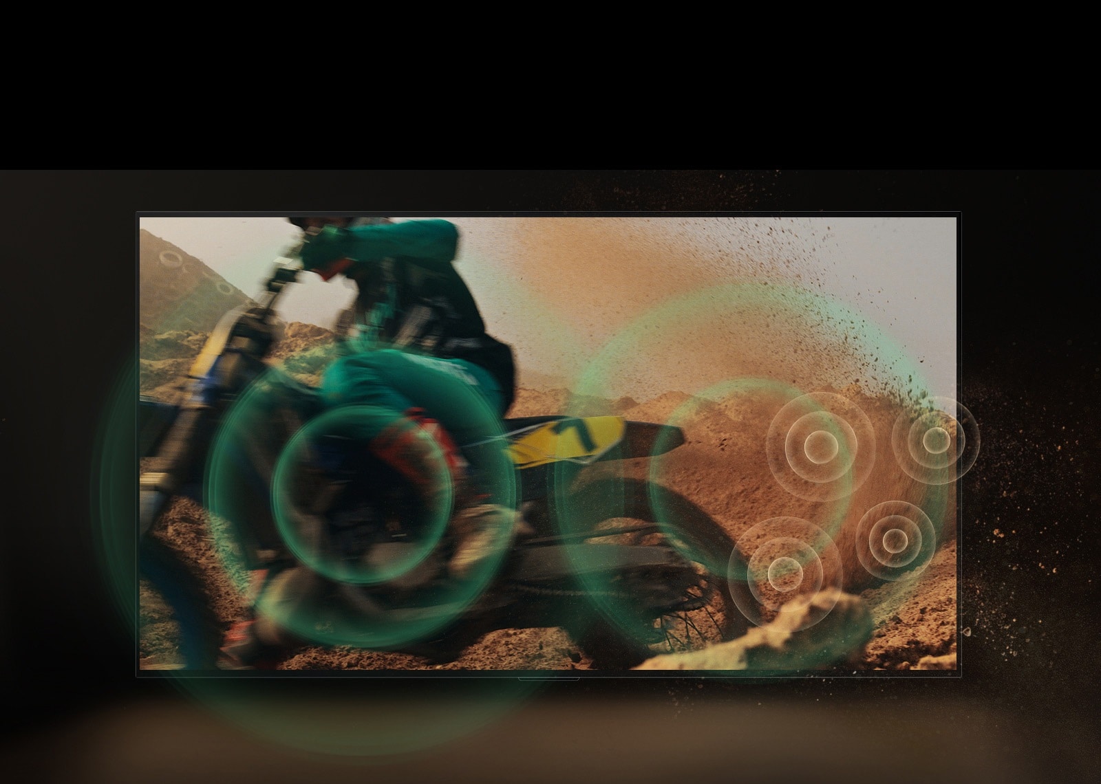 A video of a person dirt biking on red, dusty land. As they take a corner, green sound bubbles appear from the wheel.
