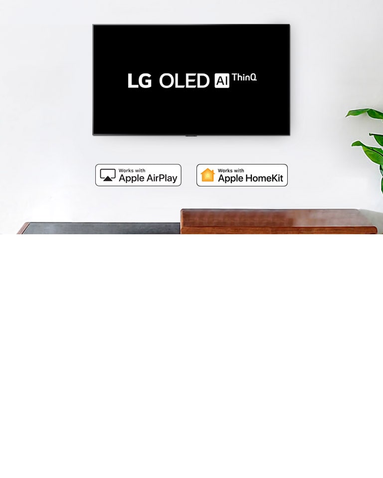 Wall-mounted TV showing LG OLED AI ThinQ logo on black background