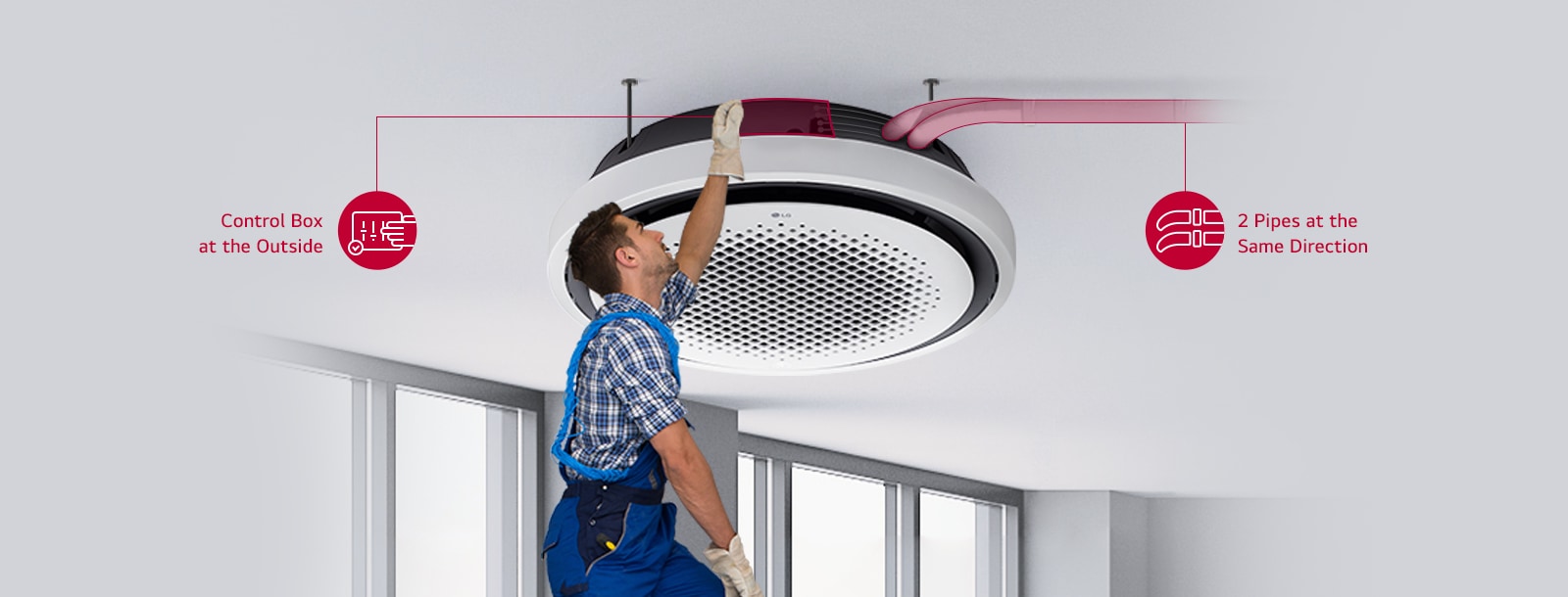 A technician easily installs the LG Round Cassette, which features an external control box and two aligned pipes mounted on a gray ceiling in a modern interior setting.