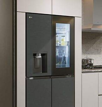 Modern kitchen interior with InstaView fridge.