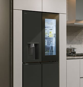 Modern kitchen interior with InstaView fridge.