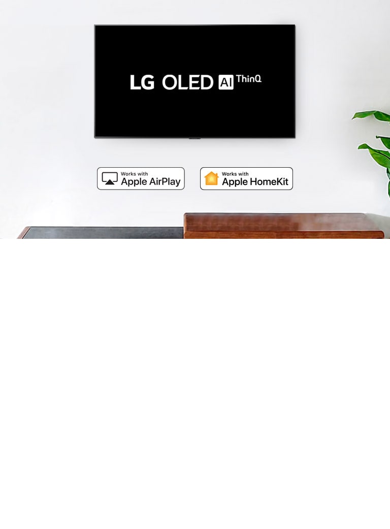 تلفزيون مثبت على الحائط يعرض شعار LG OLED بتقنية AI ThinQ على خلفية سوداء