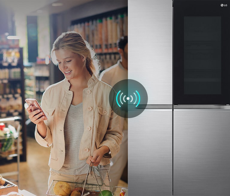 A split screen image of a women in a supermarket with a mobile phone. The woman is communicating with her fridge at home in the kitchen while she is doing the grocery shopping. Above the fridge is a wireless remote icon.