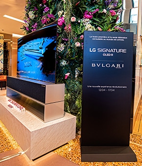 A sign about the LG SIGNATURE and BVLGARI collection is next to a Rollable OLED TV R.