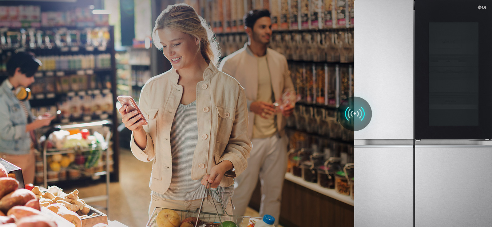 Image on the left shows a woman standing in a grocery store looking at her phone. Image on the right shows the refrigerator front view. In the center of the images is an icon to show connectivity between the phone and refrigerator.