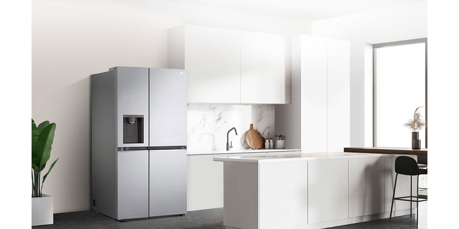 A side view of a kitchen with a black InstaView refrigerator installed.