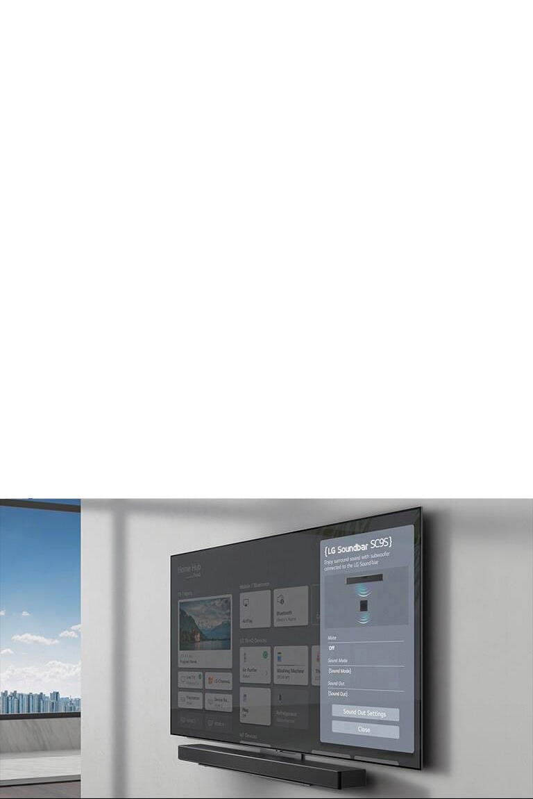 La pantalla de configuración de la barra de sonido LG SC9S se ve en el televisor montado en la pared. La barra de sonido también está colgada en la pared justo debajo del televisor.