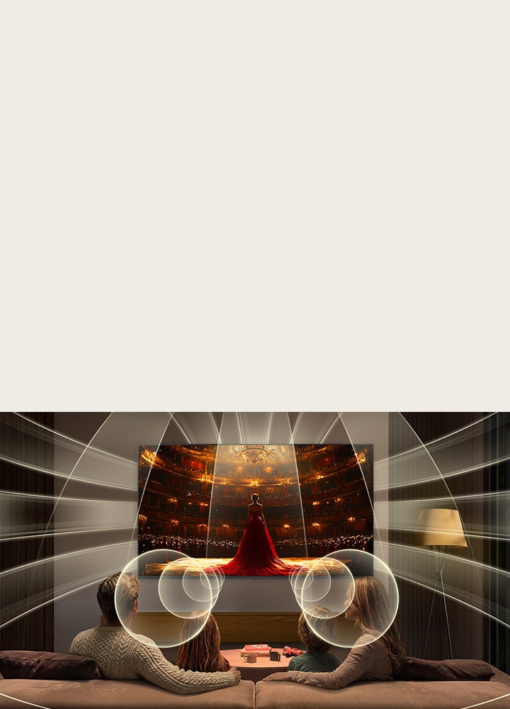 LG QNED evo AI QNED85 Mini LED with Virtual 11.1.2 Ch fills a modern living space as an opera performance plays on screen, delivering multi-directional sound that surrounds the seating area and enhances immersion throughout the room.