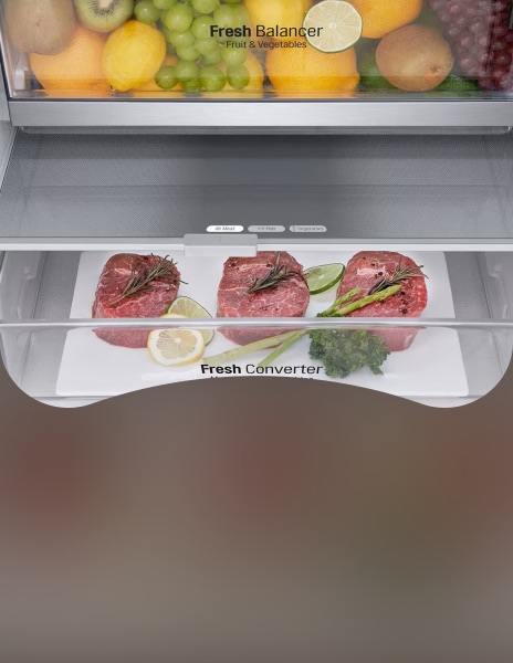 Close-up of LG Fresh Balancer and Fresh Converter drawers inside fridge freezer, storing fruit, vegetables, and fresh meat to keep food fresher for longer.