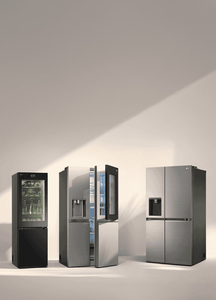 Three LG fridge freezers in sunlight. The left slim fridge has a transparent door with green-lit shelves inside. Next to it are Multi-Door and American Style models.