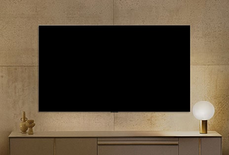 LG QNED evo AI QNED85 Mini LED looks powered down on the wall, then Gallery Mode turns on, shows information, and cycles through different artworks.