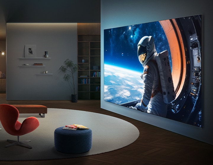 LG QNED evo AI QNED85 Mini LED Ultra Big TV is wall-mounted in a modern living space, displaying a large-scale astronaut scene across a wide screen that visually fills the room and creates a strong cinematic presence.