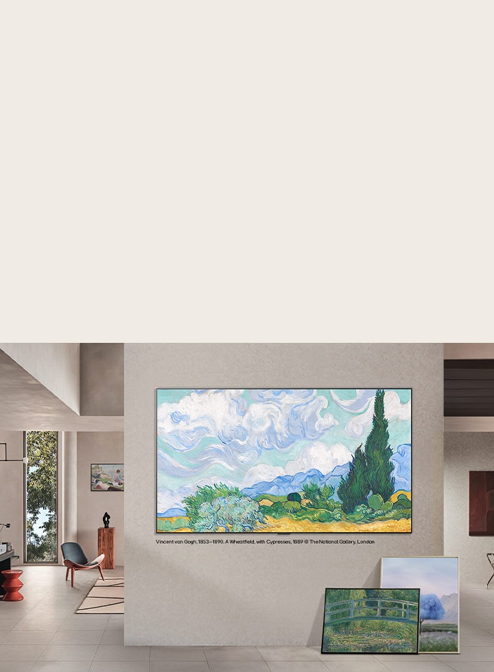 LG QNED evo AI QNED85 Mini LED with LG Gallery+ Diverse Art Content displays artworks on a wall-mounted screen in a gallery-style living space, accompanied by a canvas and additional framed art nearby.