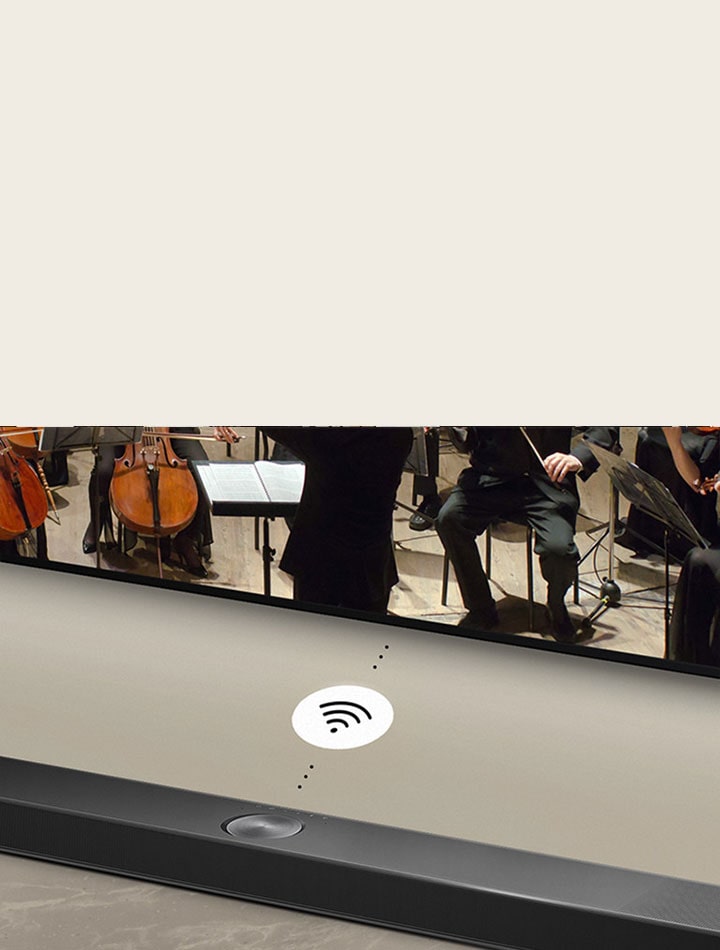 Eine Nahaufnahme einer LG Soundbar unter einem LG TV. Ein Konnektivitätssymbol symbolisiert den Drahtlosbetrieb von WOWCAST.