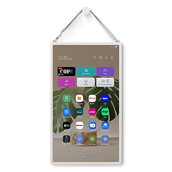 LG StanbyME 2 is hung on the wall using the wall strap.