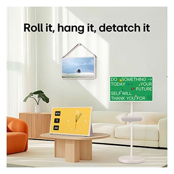 LG StanbyME 2 screens displayed in a modern living room. There is a StanbyME 2 on a stand, one is hung on the wall, and the other is propped up on a table using the folio cover.