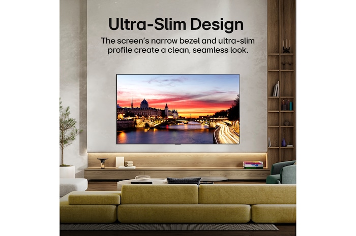 LG OLED evo AI C6 is wall-mounted in a styled living space, featuring an ultra-slim design with narrow bezels, and it displays a riverside cityscape at sunset on screen.