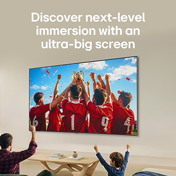LG QNED evo AI QNED85 Ultra Big TV is wall-mounted in a living room, displaying a sports victory celebration with vivid colors and refined picture quality across the wide screen as a family cheers together.