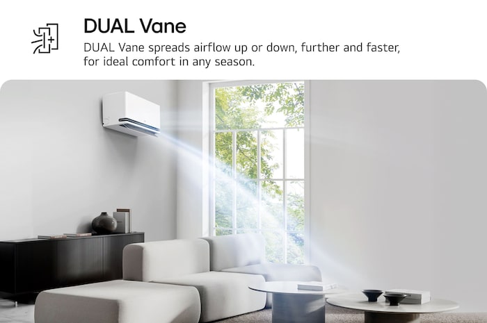 LG Dual Vane air conditioner shown in a living room. Cool air flows upward on the left. The accompanying text reads: 'DUAL Vane spreads airflow up or down, further and faster, for ideal comfort in any season.'