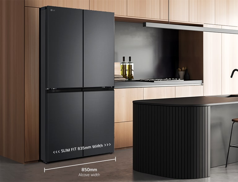 Modern kitchen interior with stainless fridge.