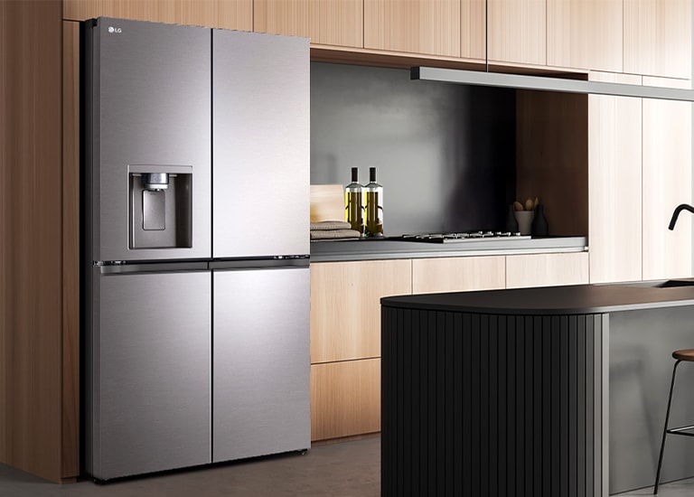 Modern kitchen interior with InstaView fridge.