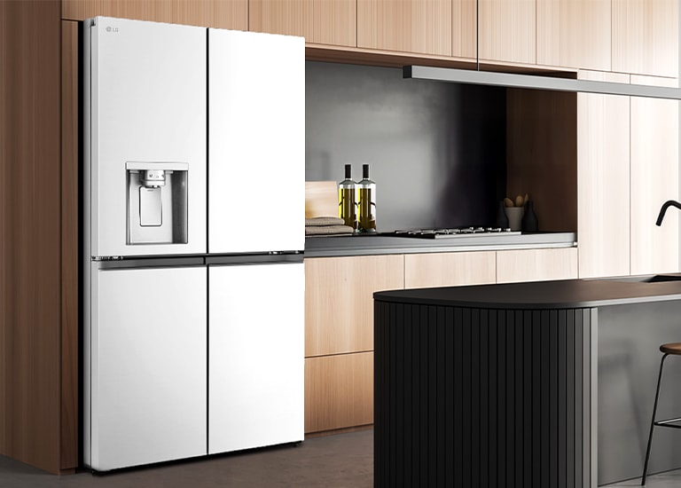 Modern kitchen interior with InstaView fridge.