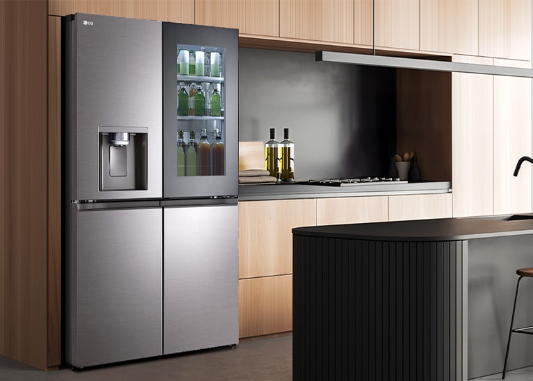 Modern kitchen interior with InstaView fridge.