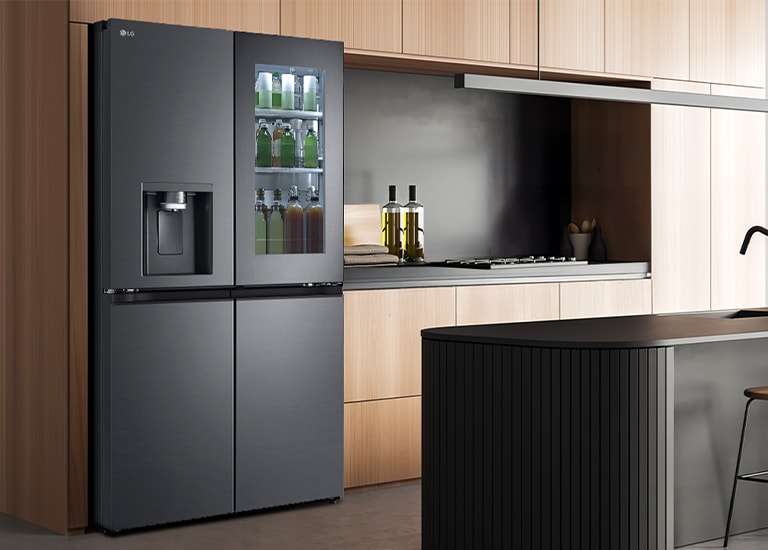 Modern kitchen interior with InstaView fridge.