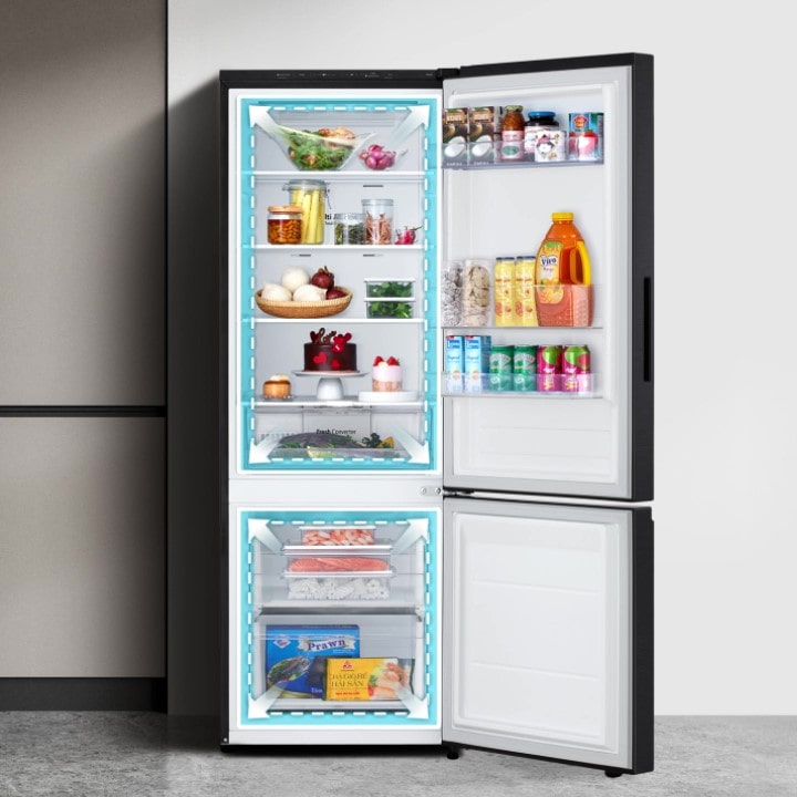 A lg bottom freezer refrigerato neatly organized shelves filled with various foods and beverages.	