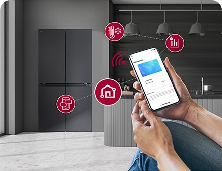 Modern kitchen interior with smart phone communicating with fridge via wifi