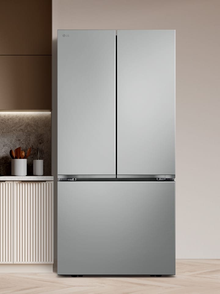 The front view of lg french door refrigerator in a wood tone modern kitchen room.