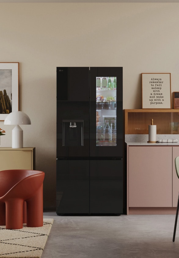 A retro modern kitchen is reflected in the sleek design of the lg french door refrigerator with a black mirror door.