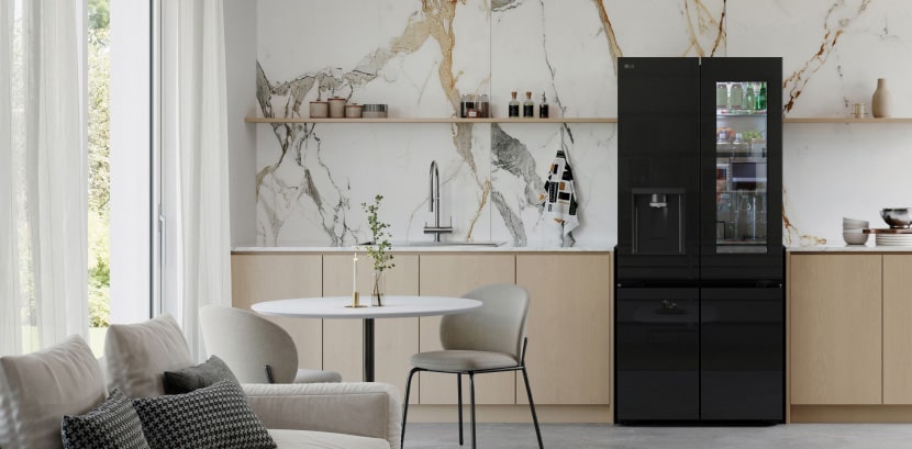 Completing the stylish kitchen space, the LG french door refrigerator with black mirror doors.