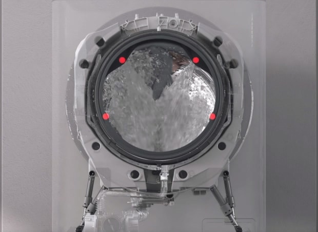 Image shows 4 streams of water coming out from the top and bottom of the drum.