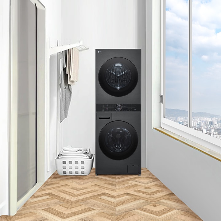 Wash tower installed in an enclosed balcony space