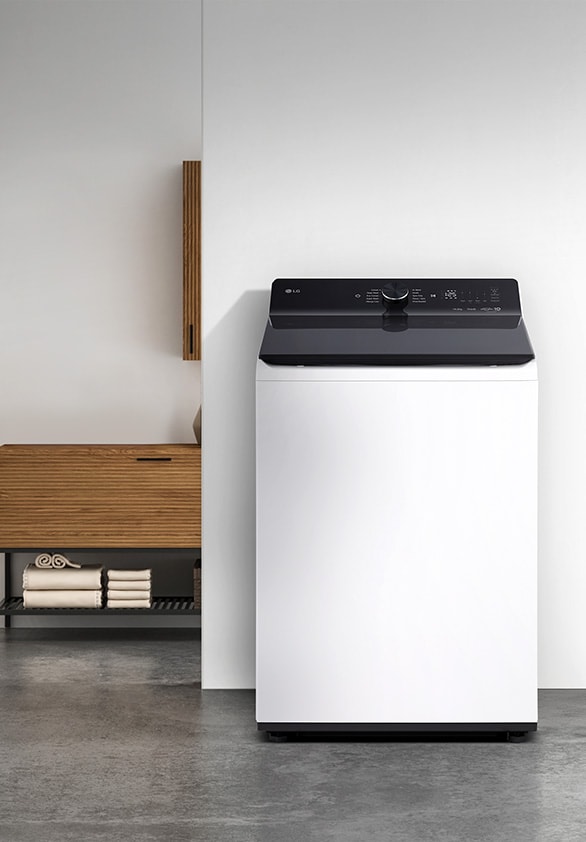 LG top load washing machine in the laundry room