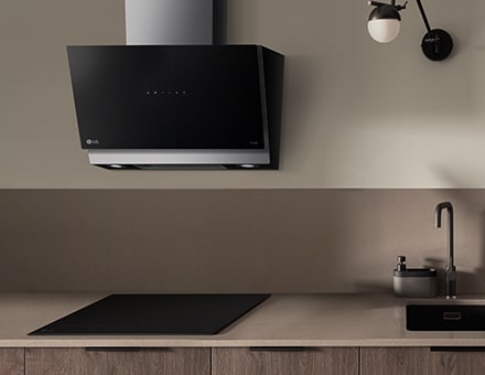 The LG built-in induction cooktop and hood installed in the kitchen.