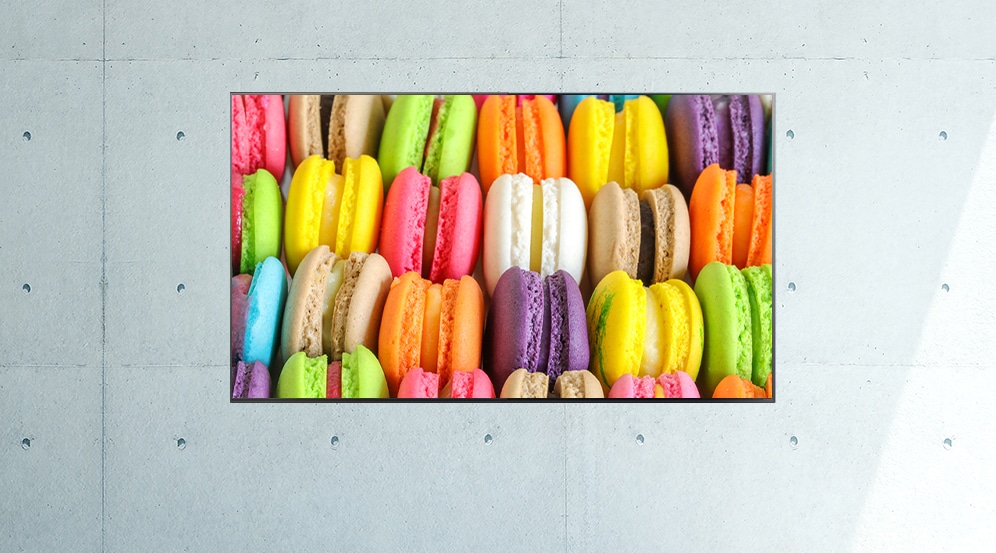 Image of different coloured macarons displayed on screen