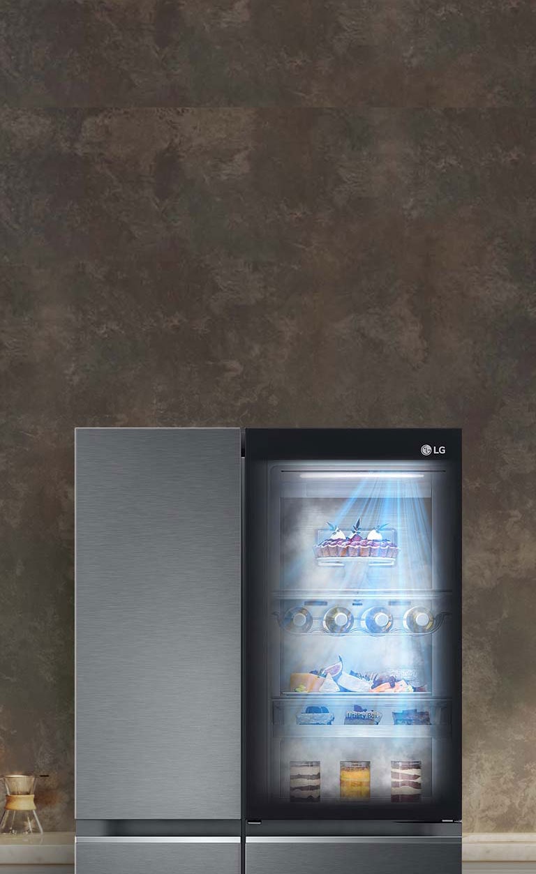 The front view of a black InstaView refrigerator with the light on inside. The contents of the refrigerator can be seen through the InstaView door. Blue rays of light shine down over the contents from the SurroundCooling function.