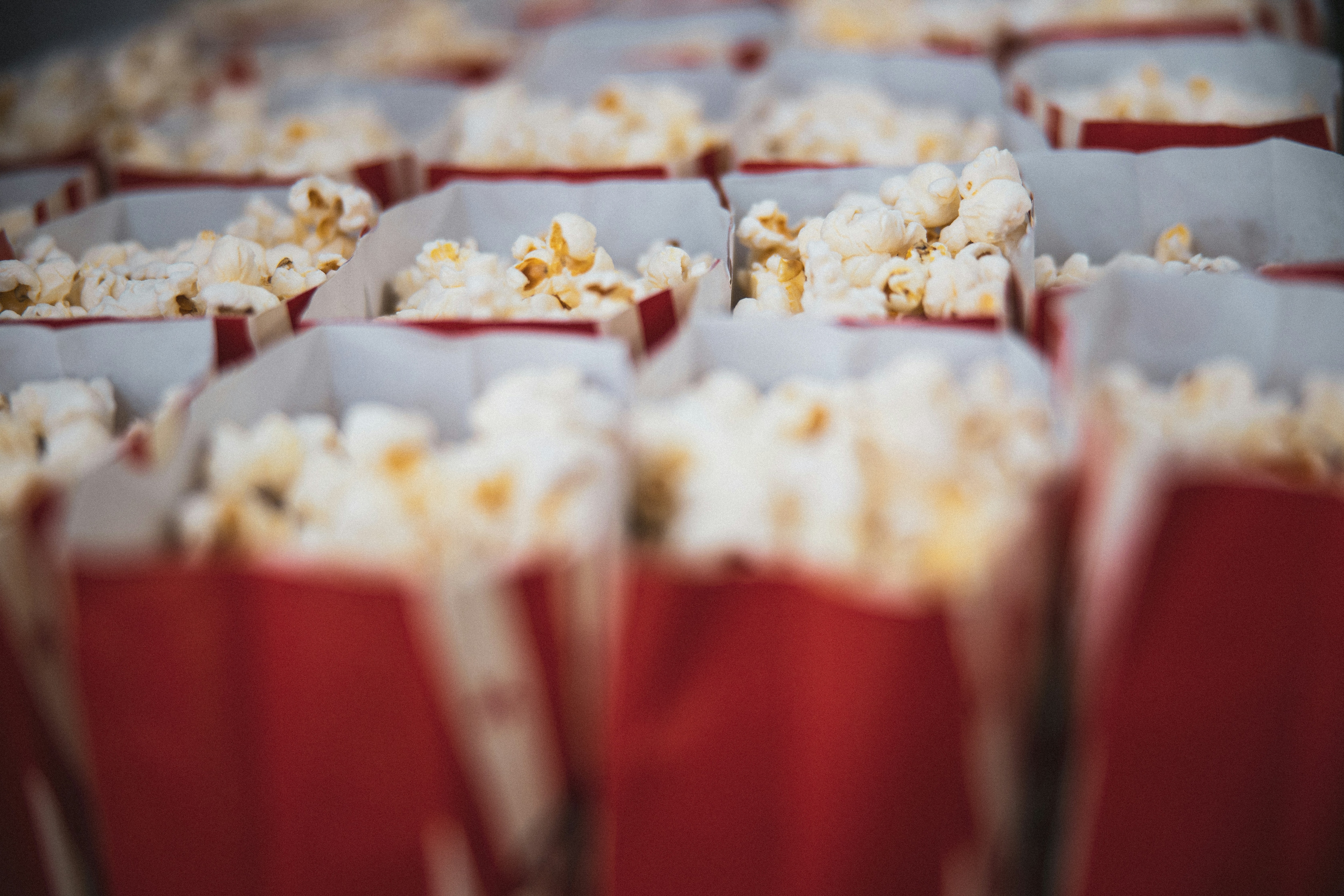 Enhance family movie nights with premier home cinema tech and popcorn for an unforgettable experience.