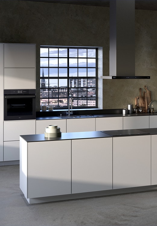 The kitchen interior with an LG built-in oven, hood, and induction cooktop installed.